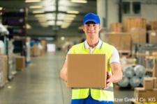 A man holds a package in his hands